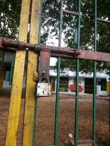 A big lock hangs at the Ainchwara Centre on the day of the exam