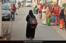 Lucknow news, Story of a burqa clad woman, deliver goods with Swiggy delivery bag, Viral pic