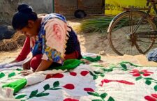 Women making carpets and bed sheet beautiful with their art.