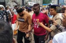 The police taking the accused to jail