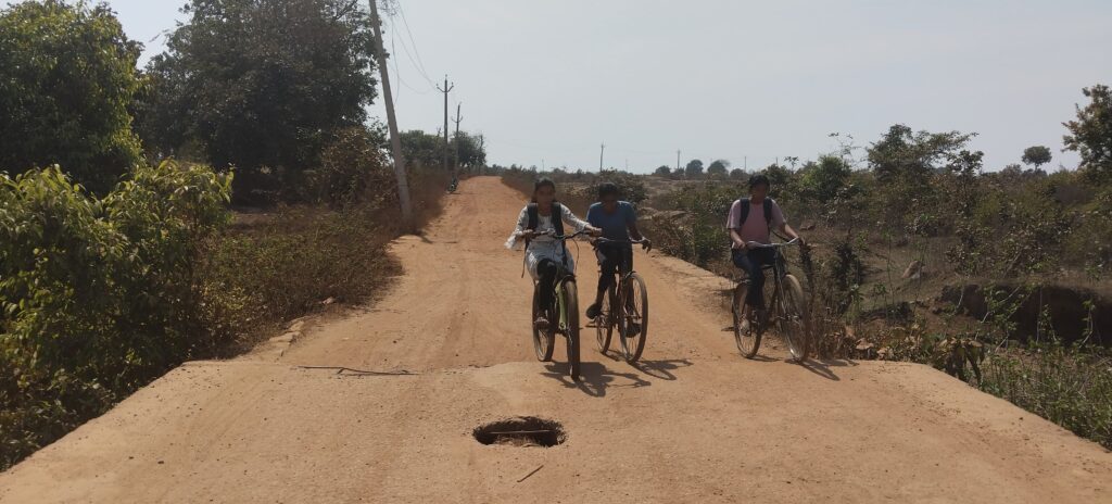 People walking helplessly on bad road