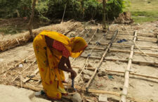 Chameli Devi drying spices in the sun