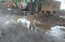 The street is filled with dirty water