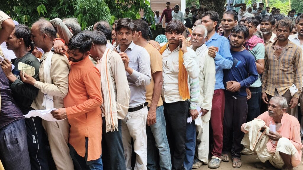 Farmers standing in line for fertilizer
