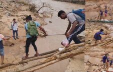 Children are forced to go to school by hanging on to wires.