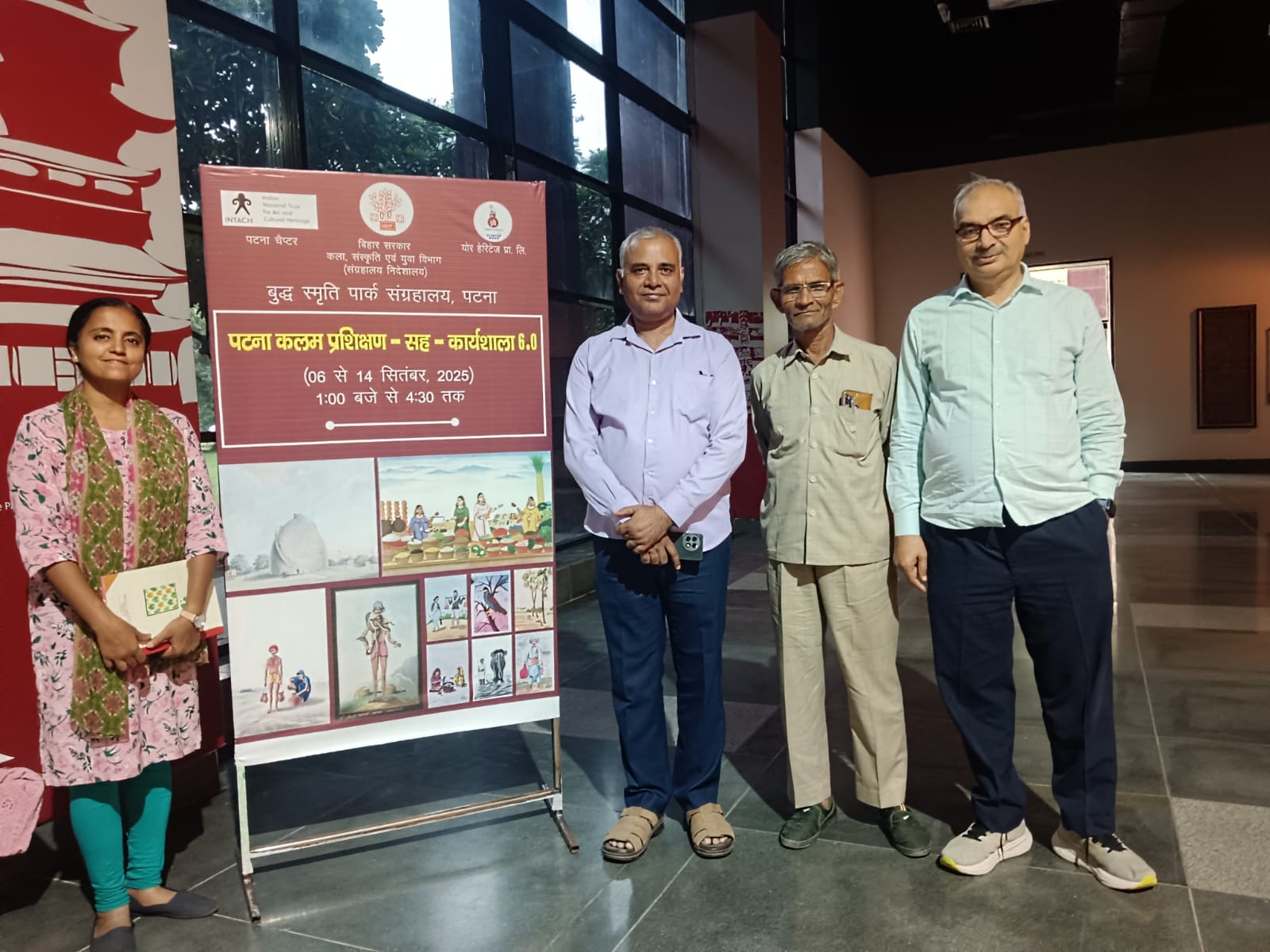The woman standing near the post is Rachana Priyadarshini