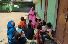 Anganwadi workers teaching children at an Anganwadi in Uttar Pradesh.